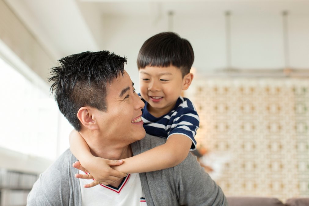photo of healthy man with child